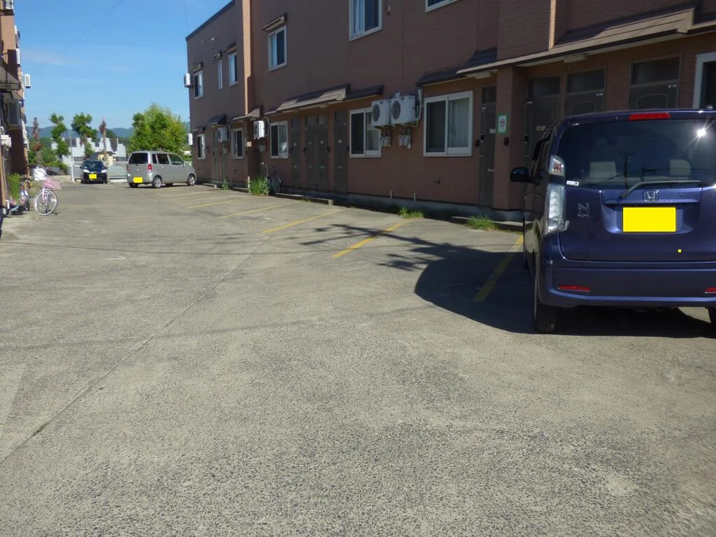 ベルメゾン A102号室 駐車場